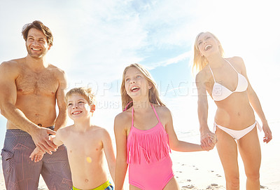 Buy stock photo Holding hands, beach and happy family on vacation outdoor for summer holiday, bonding or travel together. Mother, father or kids at ocean for adventure, support or love of parents laugh with children