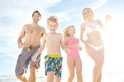 Buy stock photo Portrait, beach and sunshine with vacation, family and happiness with summer, travel and bonding together. Energy, mother or father with children, kids and seaside for holiday, adventure and journey