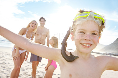 Buy stock photo Happy, family and child with goggles on beach for snorkeling, adventure and freedom on vacation. Kid, portrait and parents with boy on holiday in Florida, summer or excited smile for swimming in sea