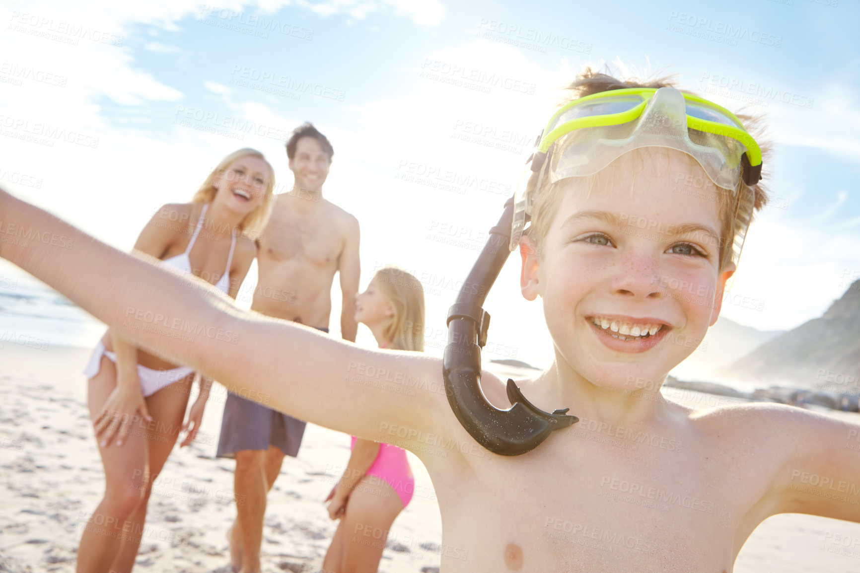 Buy stock photo Happy, family and child with goggles on beach for snorkeling, adventure and freedom on vacation. Kid, portrait and parents with boy on holiday in Florida, summer or excited smile for swimming in sea