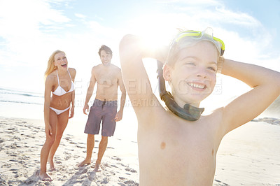 Buy stock photo Excited, family and child relax on beach with snorkeling goggles for adventure and travel on vacation. Holiday, journey and kid with parents in Florida, summer or thinking of swimming with safety