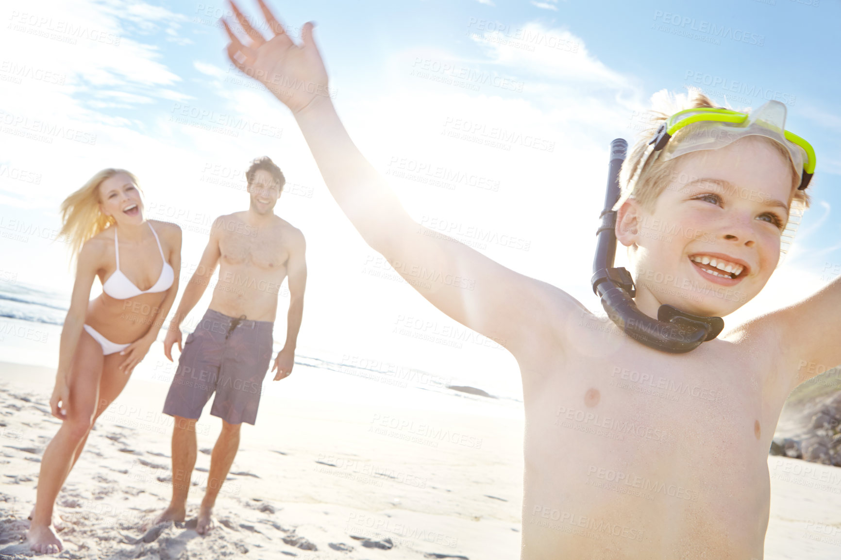 Buy stock photo Child, family and happy at beach for vacation, adventure and travel for holiday in summer. Mother, father and boy in nature with smile, energy and running in Bali with parents and freedom by ocean