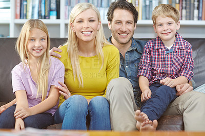 Buy stock photo Family, children and relax on couch in portrait with love, excited and happy for holiday, weekend or vacation at home. Parents or mother and father with kids together on sofa in living room or lounge