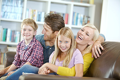 Buy stock photo Portrait of a happy family spending time together at home