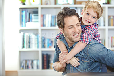 Buy stock photo Home, father and son in portrait with piggyback for bonding, playful and enjoying together in weekend. Happy family, dad and child in house for support, caring and healthy connection with parent love