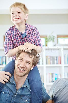 Buy stock photo Happy father, boy and piggyback with love, care or bonding together on sofa for holiday or weekend at home. Dad, child or kid with smile for fun, joy or playful day on living room couch at house