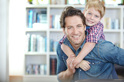 Buy stock photo Home, father and child in portrait with piggyback for bonding, playful and enjoying together in weekend. Happy family, dad and son in house for support, caring and healthy connection with parent love