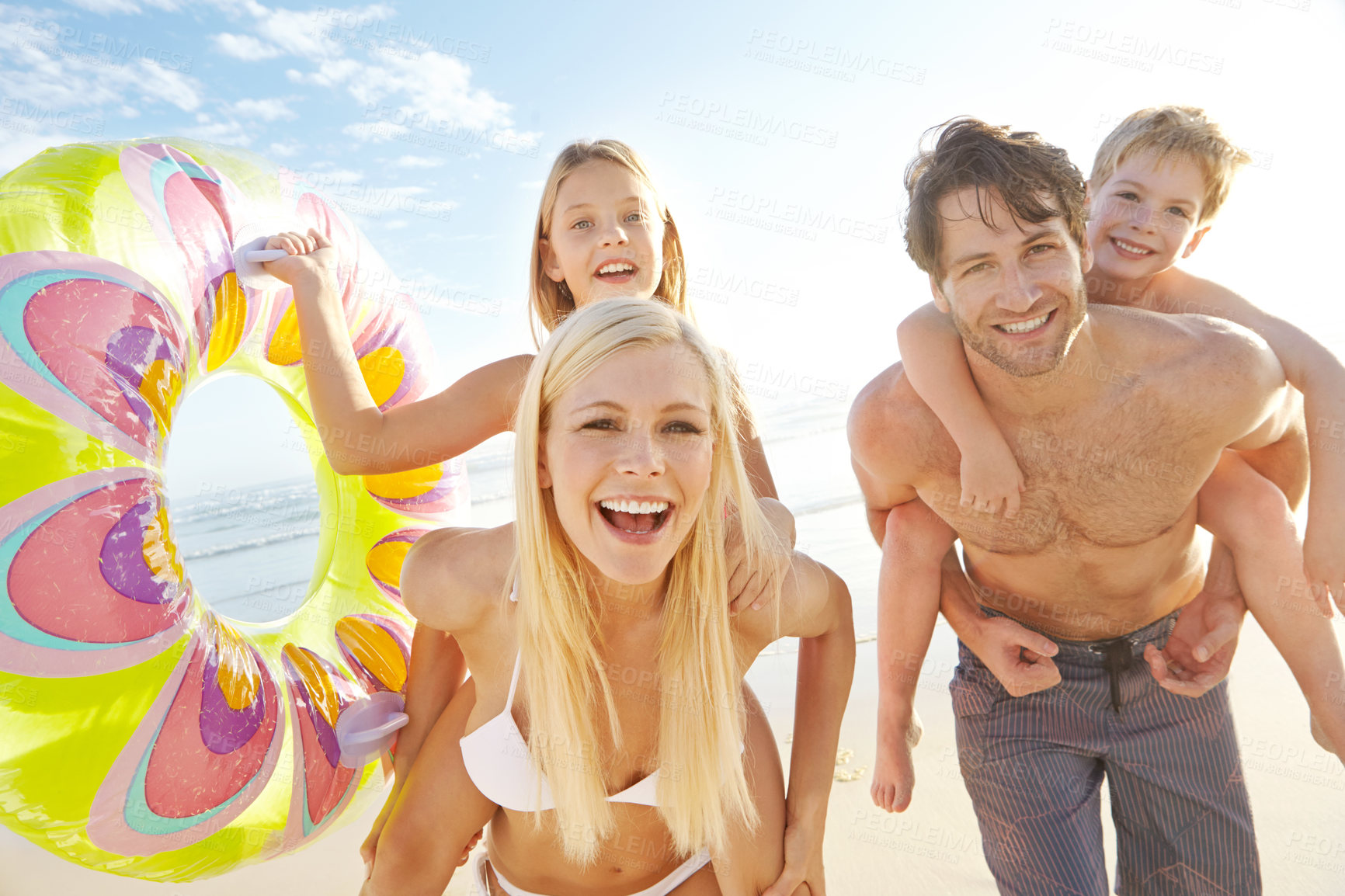 Buy stock photo Family, happy and portrait in beach for holiday in summer with bonding, support and care in Miami. Parents, kids and smile or excited with fun at seaside on vacation, trip and travel for memories