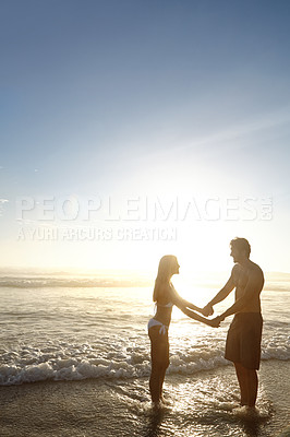 Buy stock photo Outdoor, couple and holding hands, beach and peace in water, bikini and swimwear to relax in morning. Dusk, woman and man in date, sea and travel together to Cancun, love and adventure in tropical