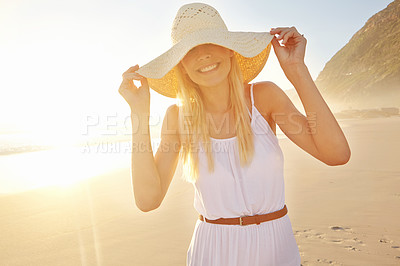 Buy stock photo Sunset, hat and happy woman walking on beach for travel, adventure and vacation in nature. Female person, journey and smile with pride for holiday, summer and sunshine on island in Thailand 