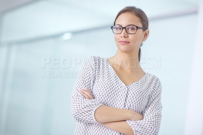 Buy stock photo Portrait of an attractive young woman standing in an office
