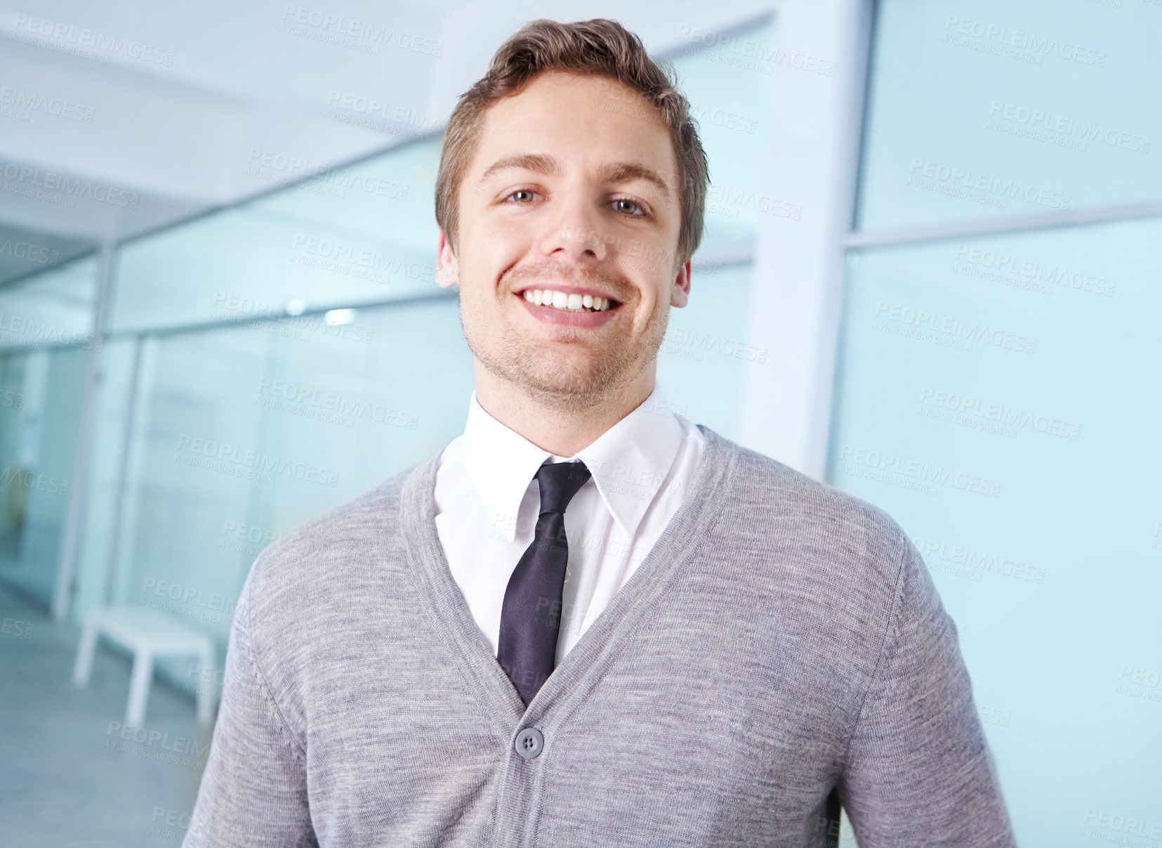 Buy stock photo Man, portrait and happy in office for business at company, work and promotion as employee with smile. Consultant, confident and face in workplace as satisfaction for job, growth or career opportunity