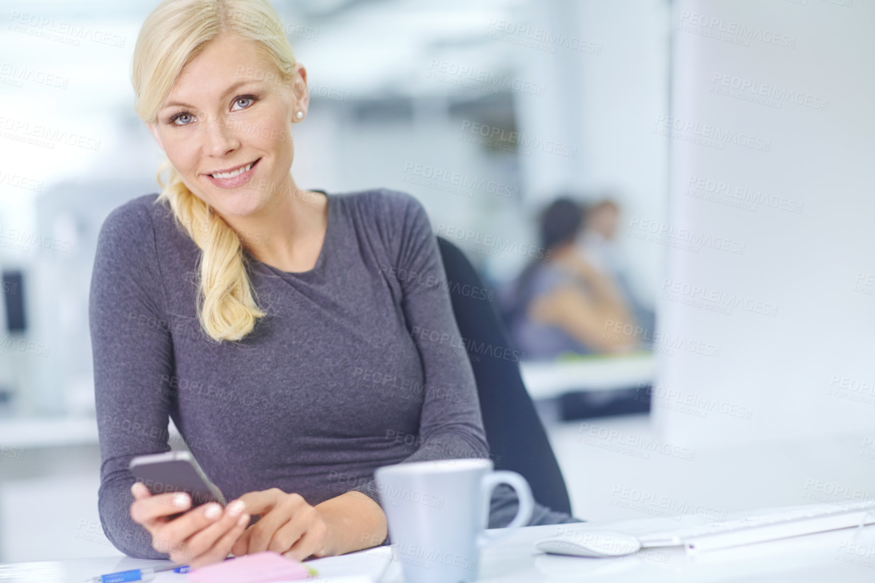 Buy stock photo Phone, portrait and smile with business woman at desk in office for communication or networking. Company, desktop and internet with happy designer typing text message on mobile in creative workplace