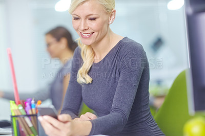 Buy stock photo Cellphone, smile and business woman in office with message, texting or social media communication. Smartphone, app and happy consultant with chat, research or online networking notification at work