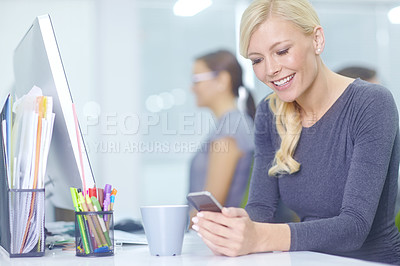 Buy stock photo Business woman, phone and text at company with social media break and scroll on website at desk. Mobile, employee and public relations worker with internet, search and message online with technology
