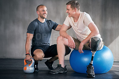 Buy stock photo Physiotherapy, kettlebell and man with disability for training, fitness and muscle strength with coach for support. Amputee, exercise ball and physiotherapist for physical rehabilitation with workout