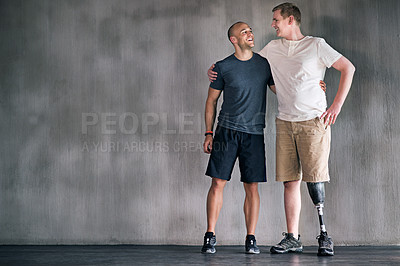Buy stock photo Physiotherapist, person with a disability and prosthetic leg and dumbbell in physiotherapy, studio and gym ball. Male people, trainer and amputee for wellness, fitness and exercise in workout session