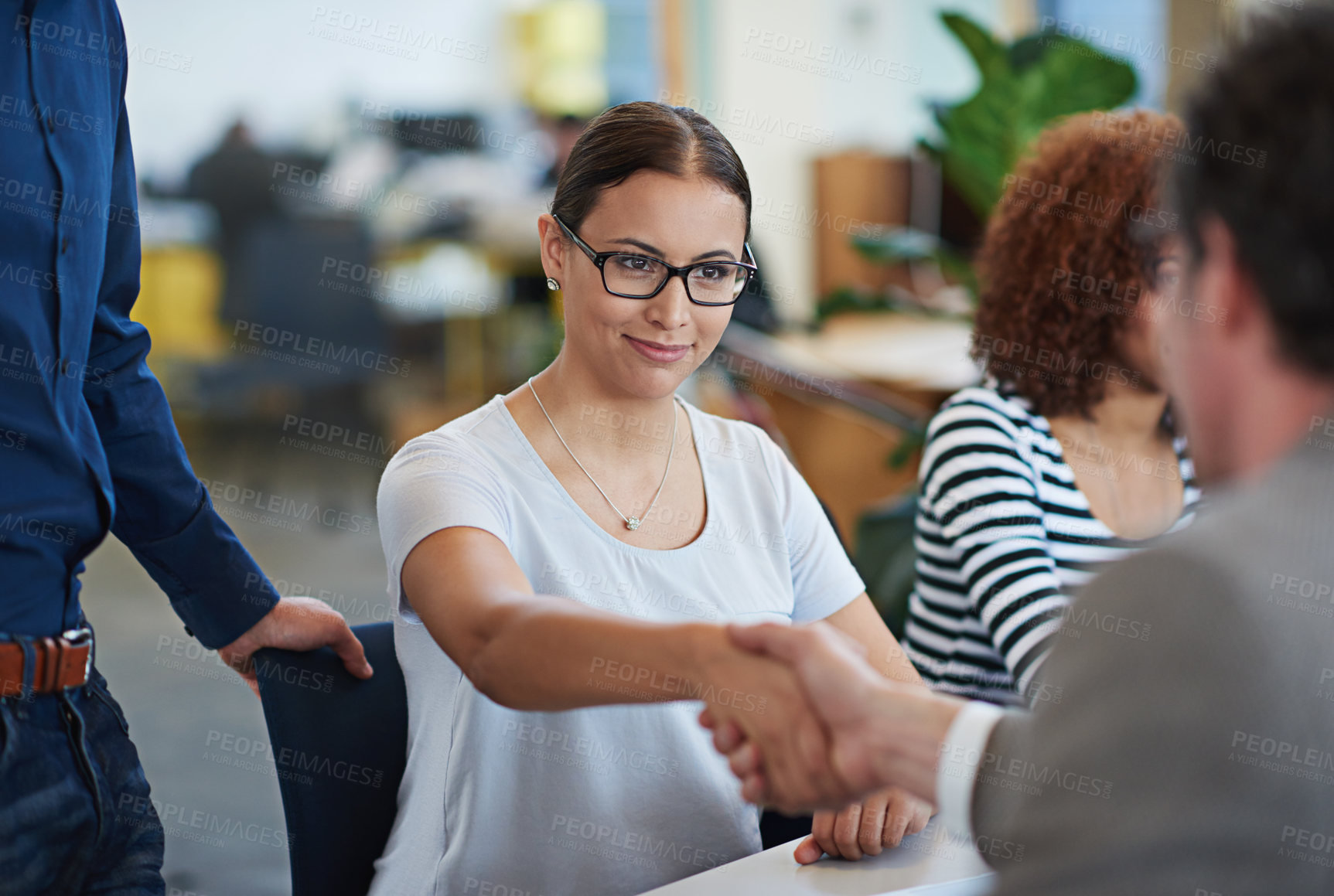 Buy stock photo Business, people and meeting with handshake in office for creative startup, teamwork and feedback for staff. Group, men and woman person with smile in professional workplace for review with report 