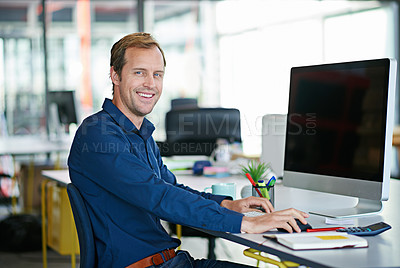 Buy stock photo Man, desk and computer in portrait in office with smile with designer for creative project. Male worker, table and workstation with technology for web design with graphic for website with confidence 