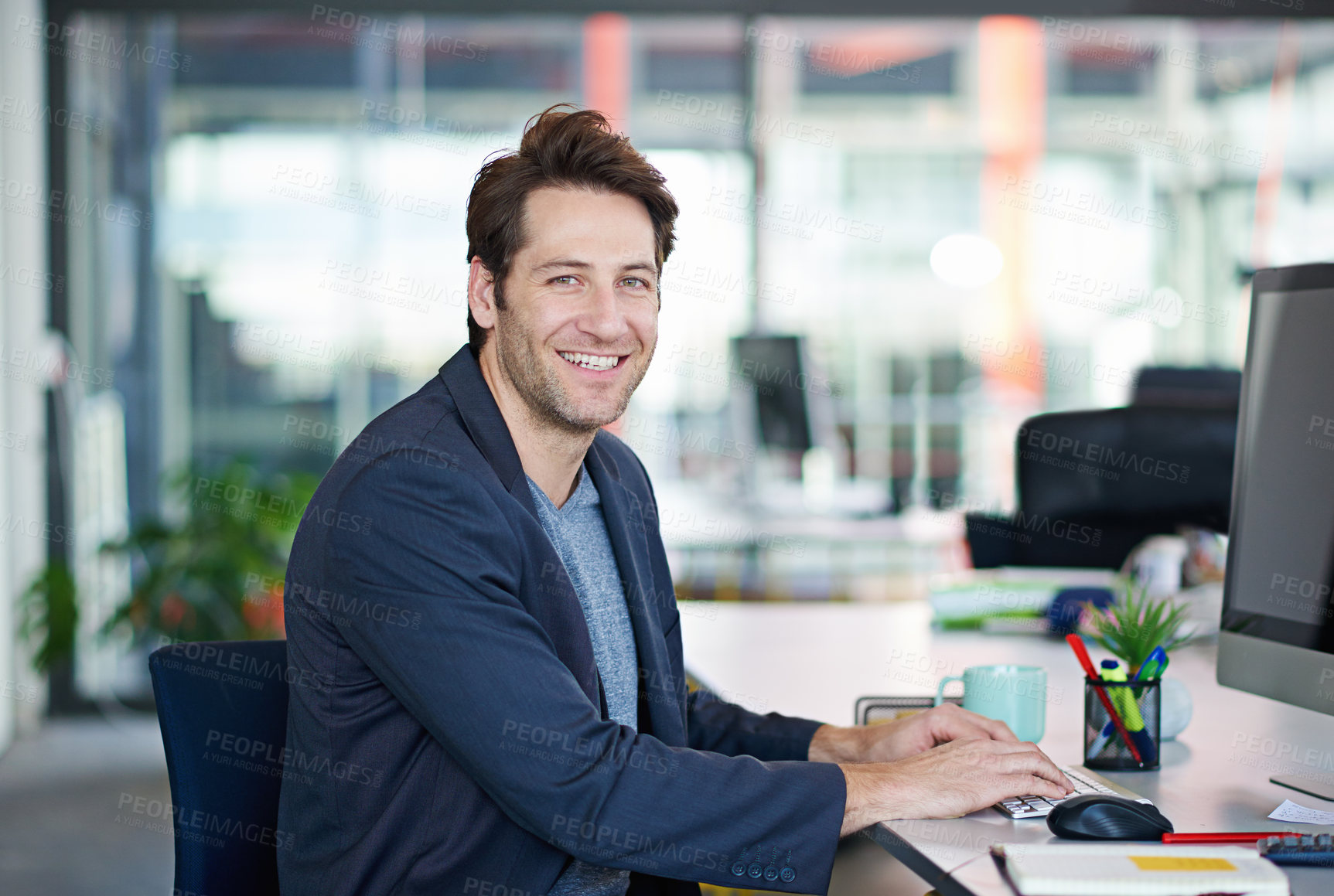 Buy stock photo Portrait, happy and businessman in office desk typing on laptop for planning, research and ideas with wireless technology. Professional, male person and working on finance project report on company