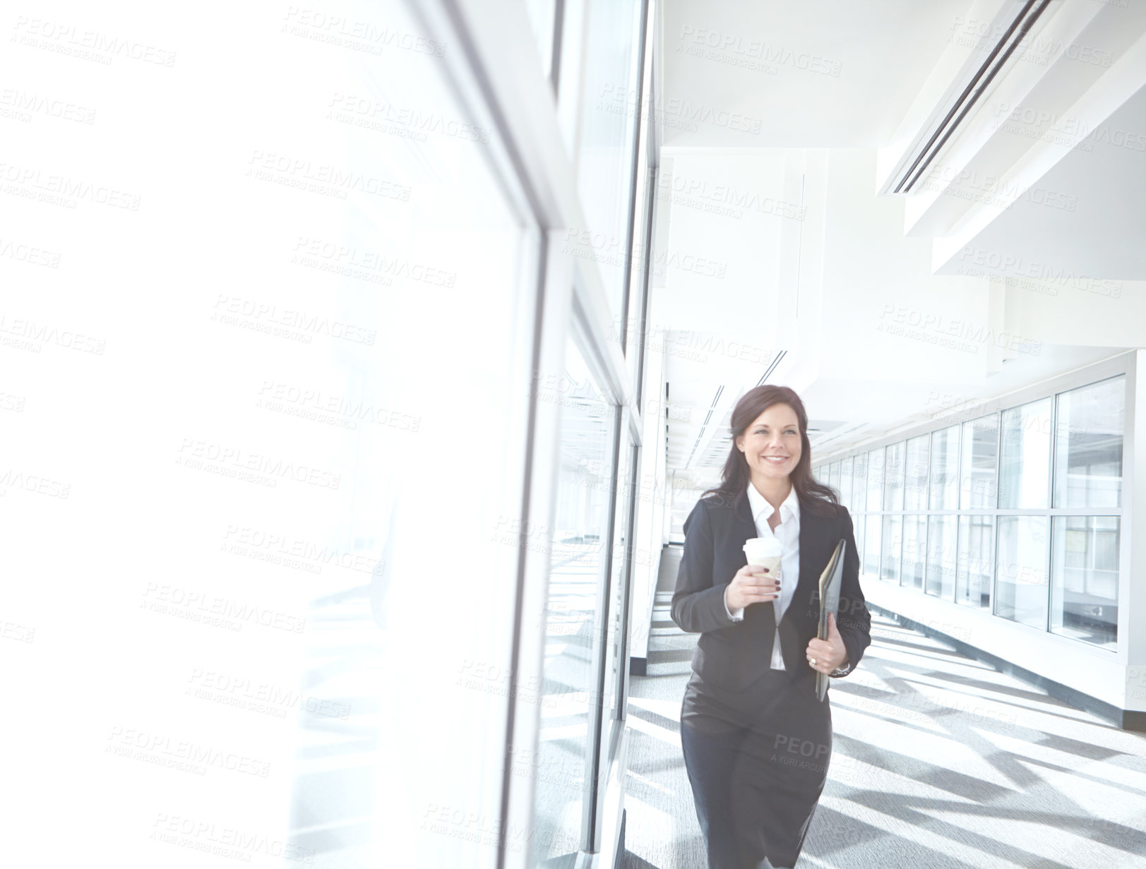 Buy stock photo Window, coffee and businesswoman in office with documents, beverage or report at legal consultancy. Drinking tea, happy advisor or confident lawyer with files, folder and paperwork in law firm lobby