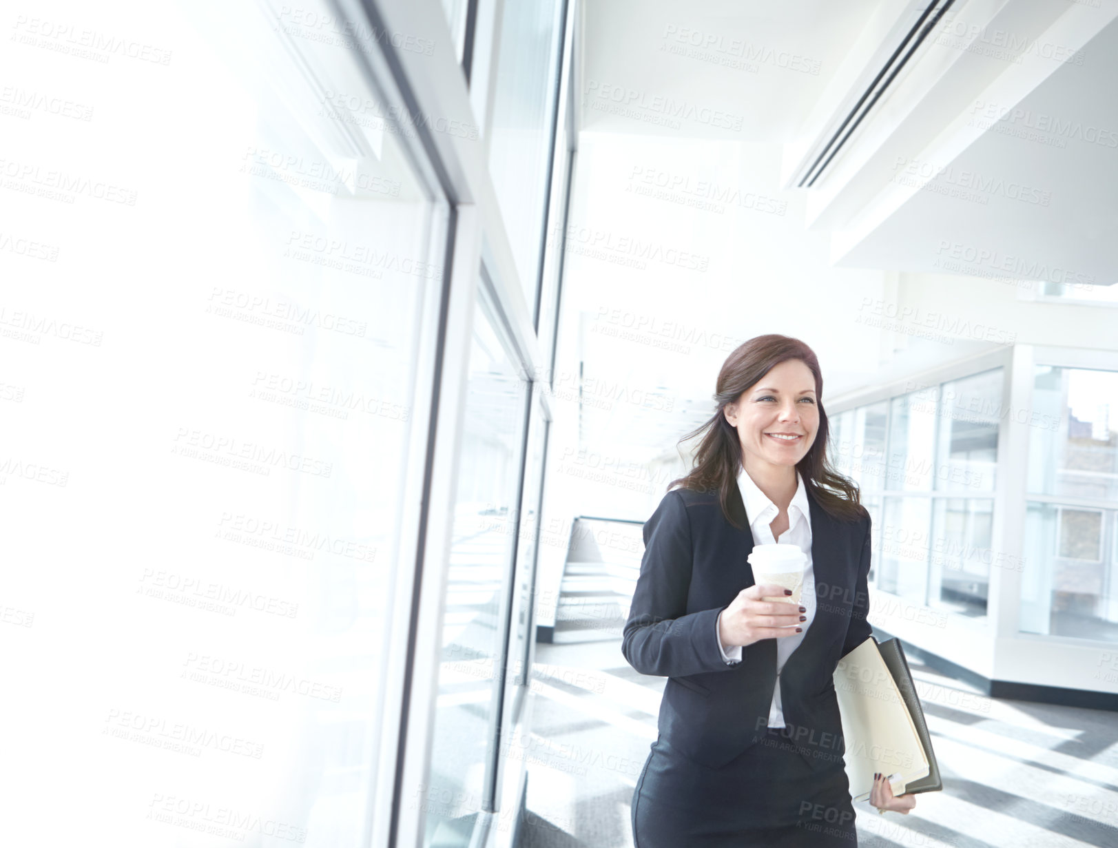 Buy stock photo Window, coffee and businesswoman in office with folder, beverage or report at legal consultancy. Drinking tea, happy or confident lawyer walking with files, documents and paperwork in law firm lobby