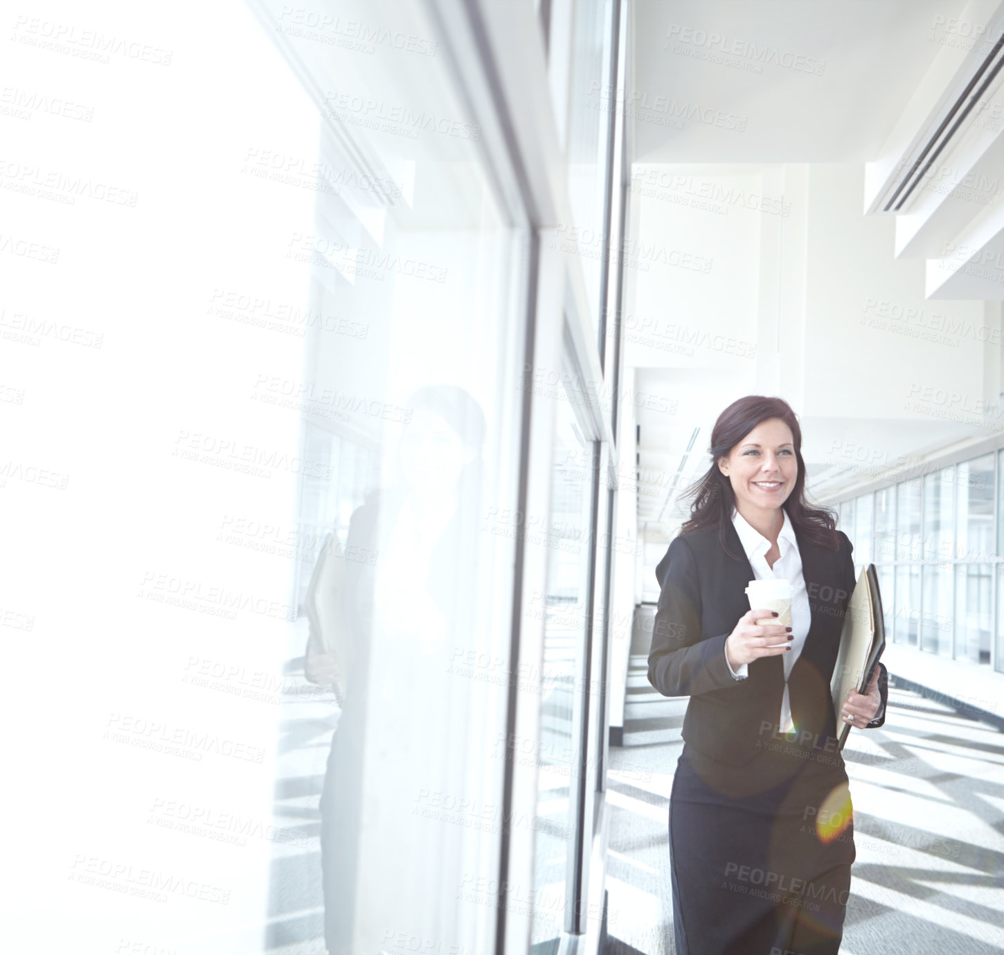 Buy stock photo Walking, coffee or businesswoman in office with folder, beverage or report at legal consultancy. Drinking tea, happy or confident lawyer with files, documents or paperwork by window in law firm lobby