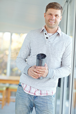 Buy stock photo Businessman, portrait and coffee cup in home, professional and beverage for getting ready at work. Male person, employee and espresso drink for waking up in morning, confident and travel mug for tea