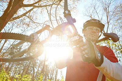 Buy stock photo Cycling, man and thinking in nature for workout, travel and fitness or exercise in countryside. Bicycle, training and outdoor sports with idea or male person in morning for cardio, wellness or health