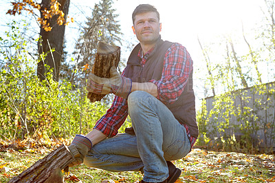 Buy stock photo Man, lumberjack and working with wood in nature, autumn season and forest management. Environmental sustainability, harvest trees and logging site in wilderness, safety gloves and collecting timber