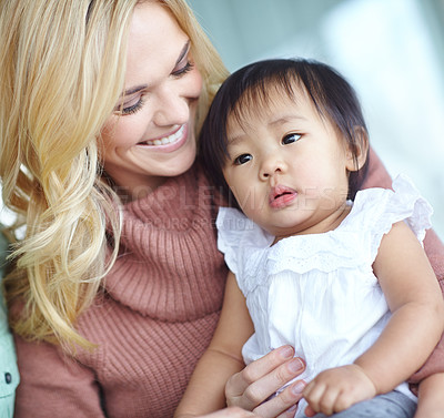 Buy stock photo Woman, Asian baby and smile in home for adopted family or bonding, together for wellness with support. Female person, Japanese child and happiness in house with care or love, parenting with relax