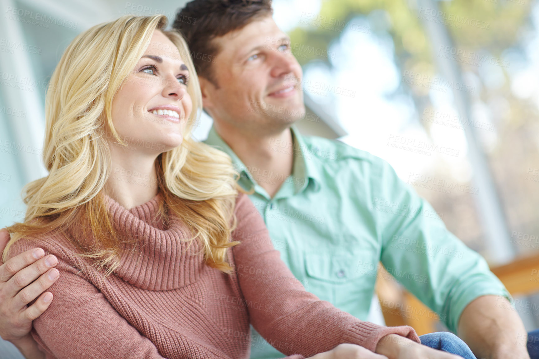 Buy stock photo Happy couple, hug and together for home date, love and relax for bonding in relationship. People, embrace and security in marriage for commitment, comfortable and weekend for partnership or cuddle