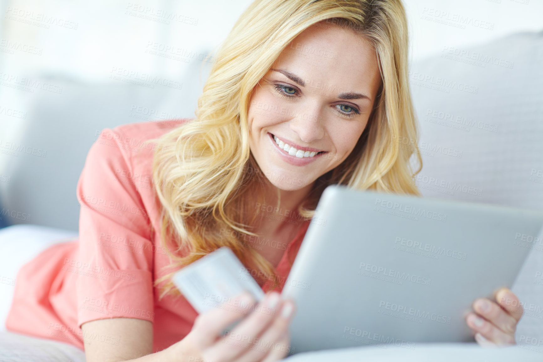 Buy stock photo Tablet, credit card and smile of woman, browsing and happy with discount, sale and online shopping. Ecommerce, customer and joy of purchase of digital product, relax and mobile app in lounge of house