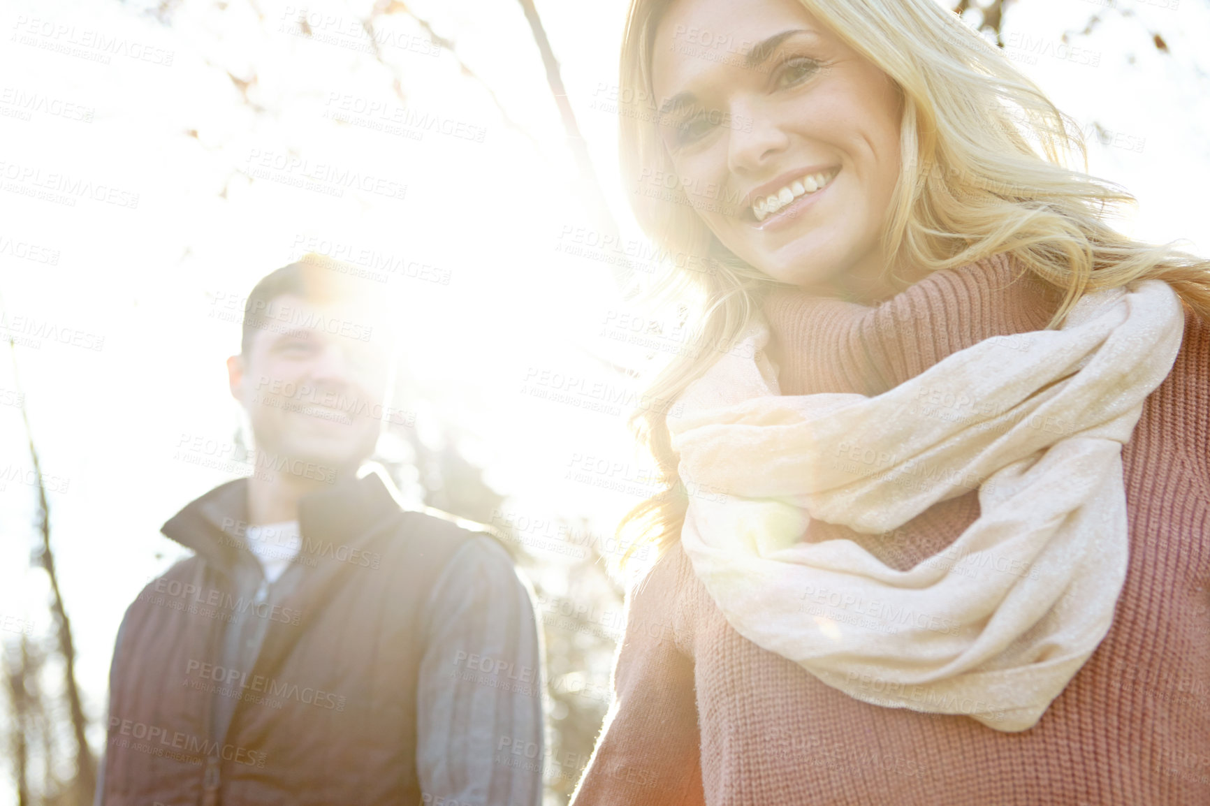 Buy stock photo Portrait, couple and walking in nature for support and adventure or love in woods or forest. Man, woman and smile or together for outdoor date, sunshine and trees in morning for anniversary and care