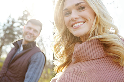 Buy stock photo Nature, couple and portrait of happy woman in forest for adventure or love in woods or park. Man, smile and together for outdoor date, support and trees in morning for anniversary, romance and travel