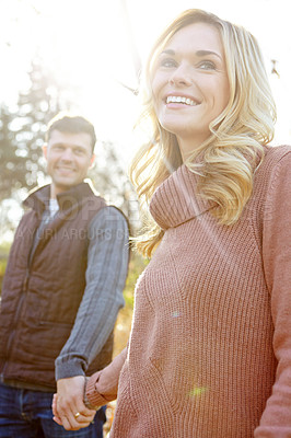 Buy stock photo Thinking, couple and holding hands in nature for walk, adventure and love in woods or forest. Man, woman and idea or together for outdoor date, travel and support in morning for anniversary and care