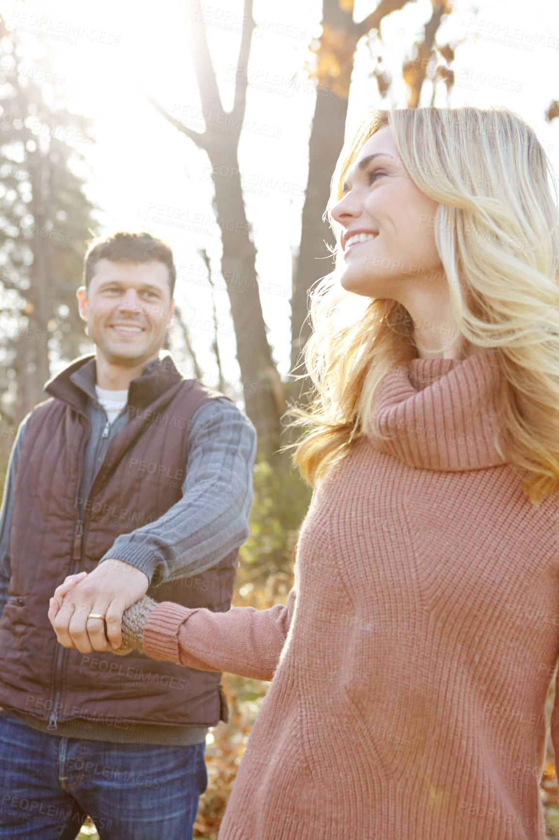 Buy stock photo Thinking, couple and holding hands in nature for walking and adventure in woods or forest. Man, woman and smile or idea for outdoor date, together and support in morning for anniversary in park