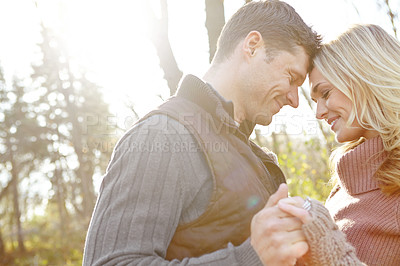 Buy stock photo Couple, together and happiness on date in woods with holding hands, respect and trust for relationship. Man, woman and outdoor holiday with smile for bonding or romance, love in nature for wellness