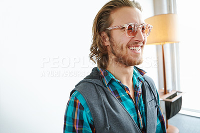 Buy stock photo Fashion, smile and laughing retro man with vibrant, trippy or funky outfit for wardrobe confidence. Happy, colorful and male designer from Portugal for vintage style by white wall in home or house