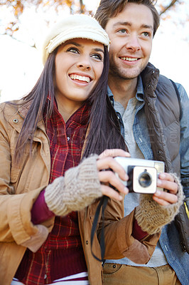 Buy stock photo Smile, couple and photography in nature with camera for hiking and camping in woods or park. Forest, man and woman or photographer outdoor for travel, memory and partner or together for adventure