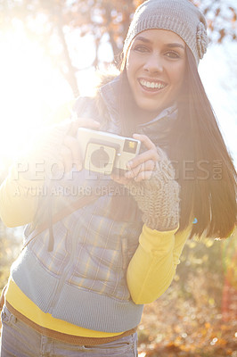 Buy stock photo Portrait, photography and woman with camera outdoor for adventure travel, explore nature and sightseeing memory. Smile, female photographer and vintage equipment for scenery of location destination