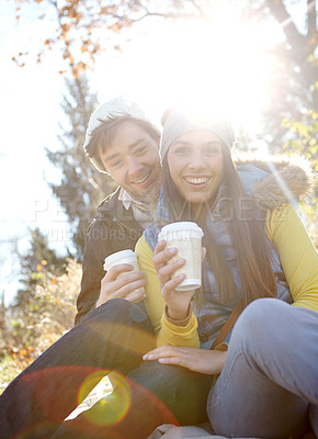 Buy stock photo Couple, coffee and hug in nature portrait for romance, bonding and outdoor park for commitment. People, woods and hot chocolate to relax in winter season for love, espresso and embrace for security