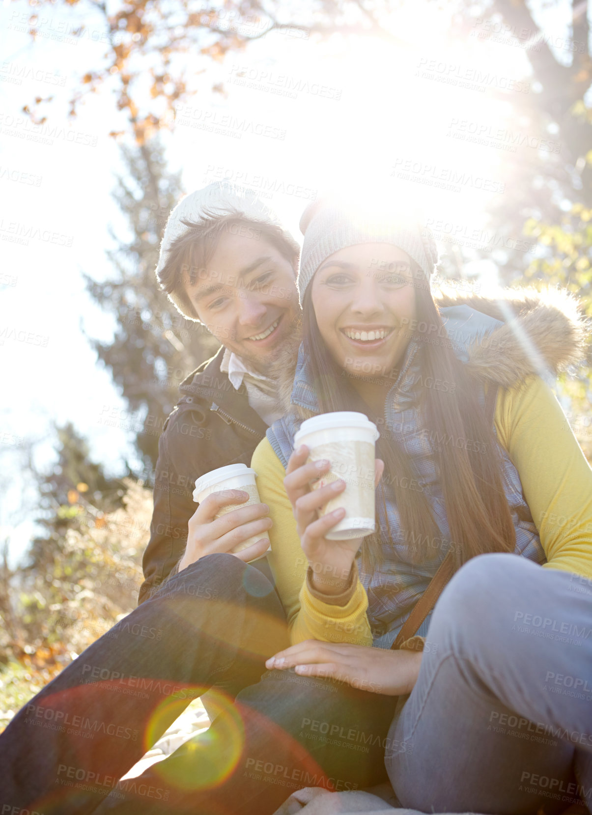 Buy stock photo Couple, coffee and hug in nature portrait for romance, bonding and outdoor park for commitment. People, woods and hot chocolate to relax in winter season for love, espresso and embrace for security