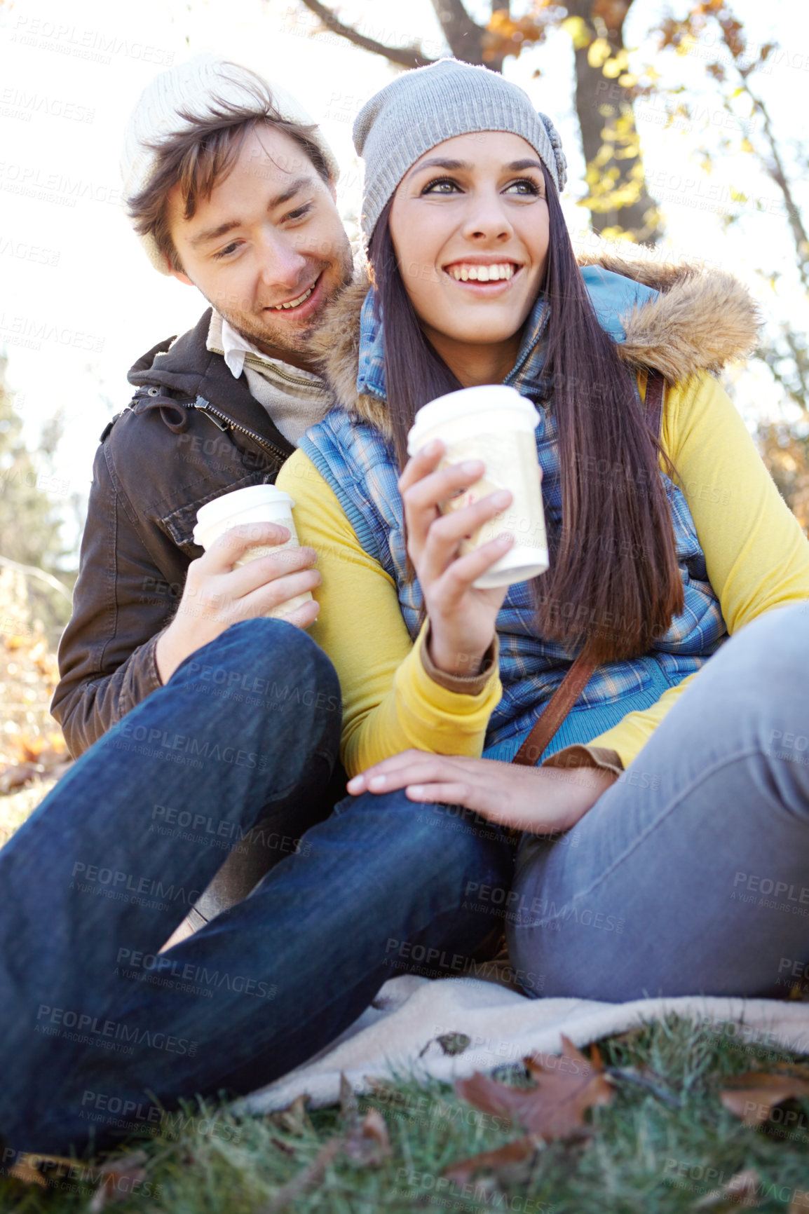 Buy stock photo Couple, travel and relax with coffee in nature for bonding, picnic and winter adventure in environment. People, smile and caffeine drink in forest on holiday, vacation or together in woods with love