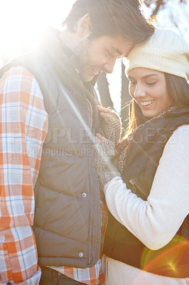 Buy stock photo Nature, love and couple with smile in forest for relationship, affection or anniversary date. Outdoor, morning and happy man with woman for romance, winter vacation or bonding together in Denmark