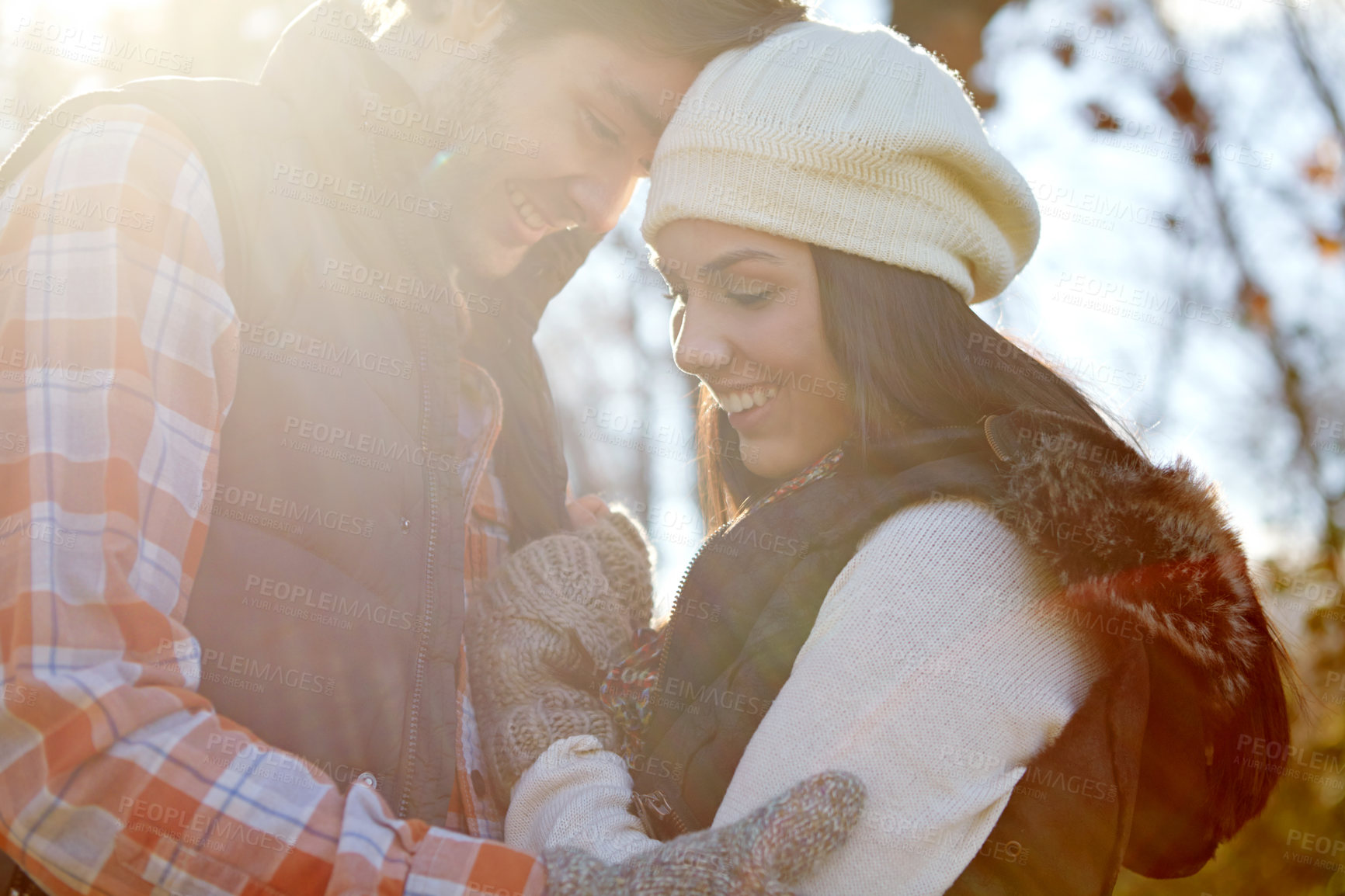 Buy stock photo Couple, winter and affection for date in forest with love relationship, warm clothes and security. Happy man, woman and romance in nature with fashion for cold climate, bonding together and loyalty