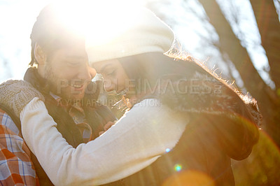 Buy stock photo Happy, couple and smile with hug in forest for outdoor adventure, break and love in morning. Woman, man and romance with affection in sunshine for anniversary, weekend or camp together in New Zealand