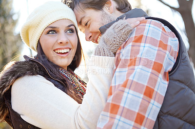 Buy stock photo Hug, cold and couple with love, outdoor and nature with romance, care and relationship. smile, man and woman with embrace, marriage and winter with trust, kindness and time together with happiness