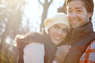 Buy stock photo Happy couple, winter and hug for love in forest with care, warm clothes and together for outdoor date. Man, woman and embrace with smile in woods for bonding, loyalty and fashion for cold climate