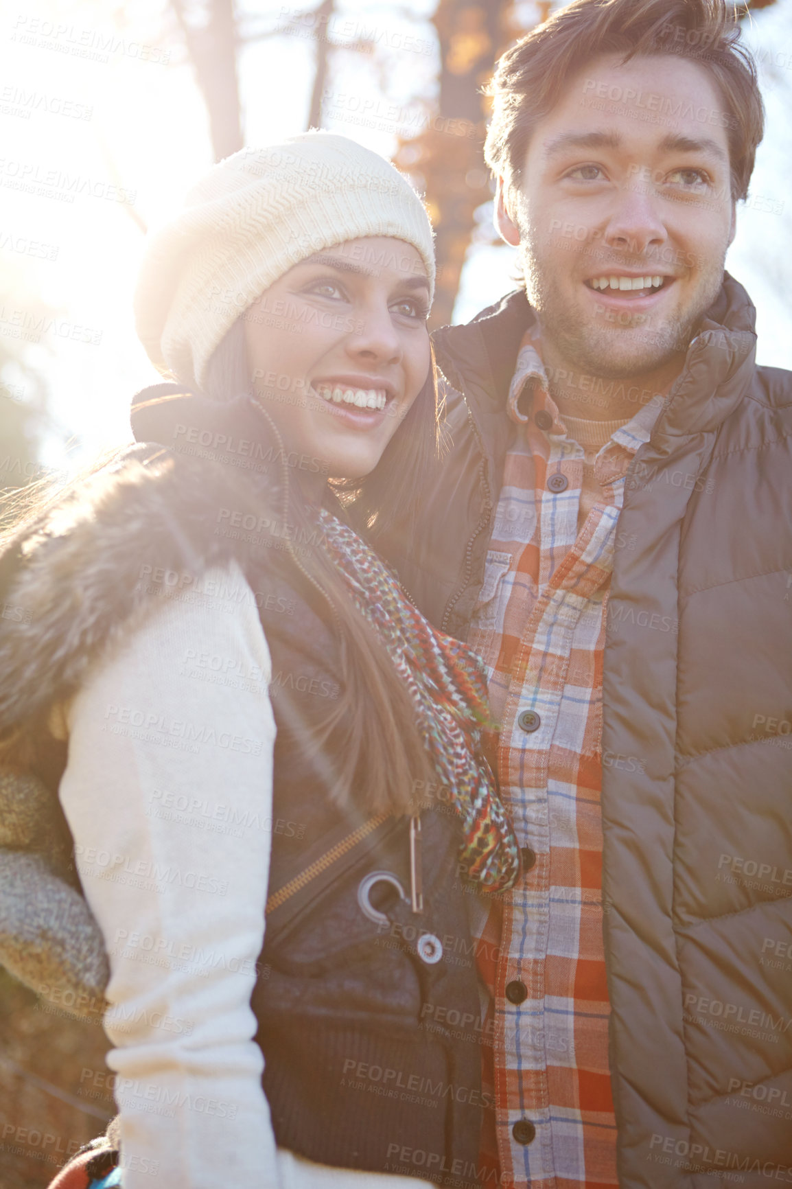 Buy stock photo Couple, love and hug with smile for morning trip, bonding and travel in winter countryside. Man, woman and happy people in embrace for forest holiday, vacation or woods with nature hiking adventure